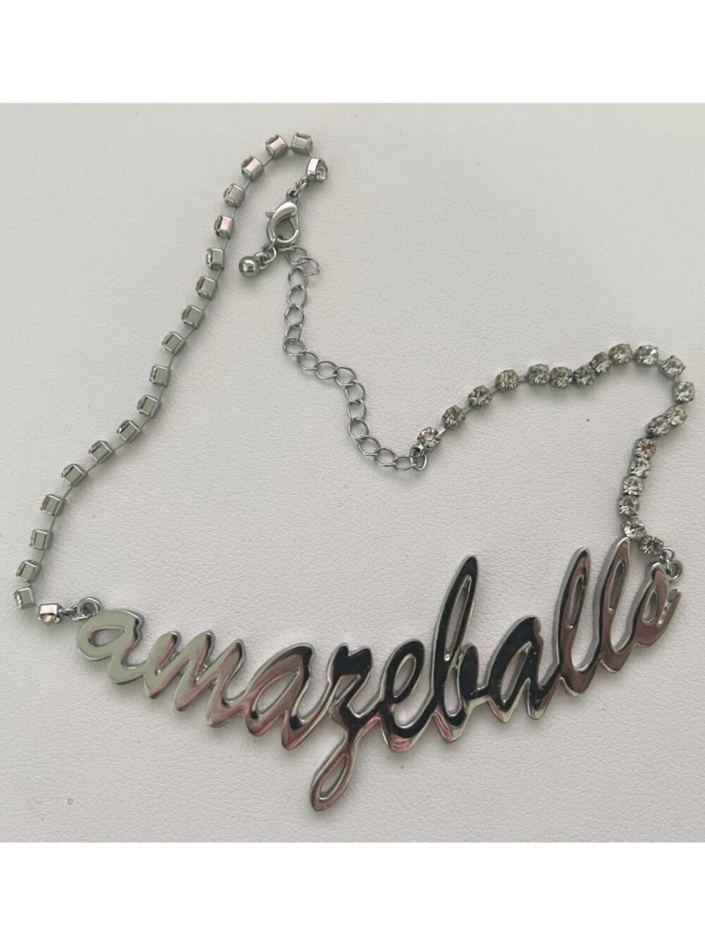 Silver, late 2000s "amazeballs" text necklace with crystals